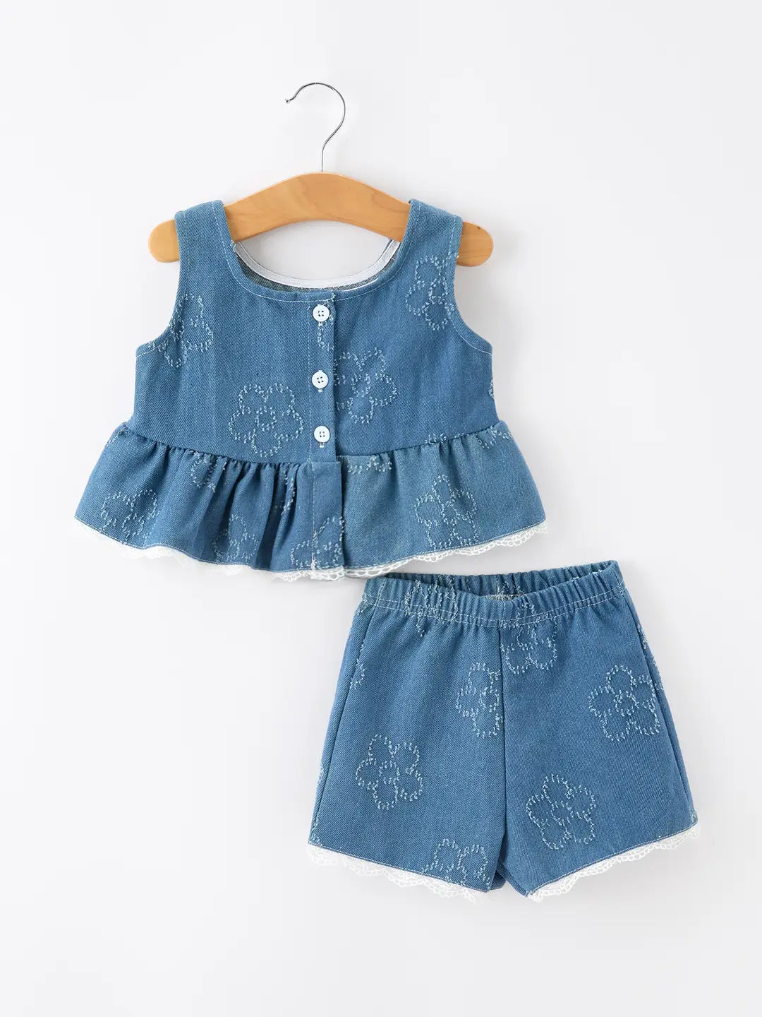 Denim children's outfit with top and shorts on a white background
